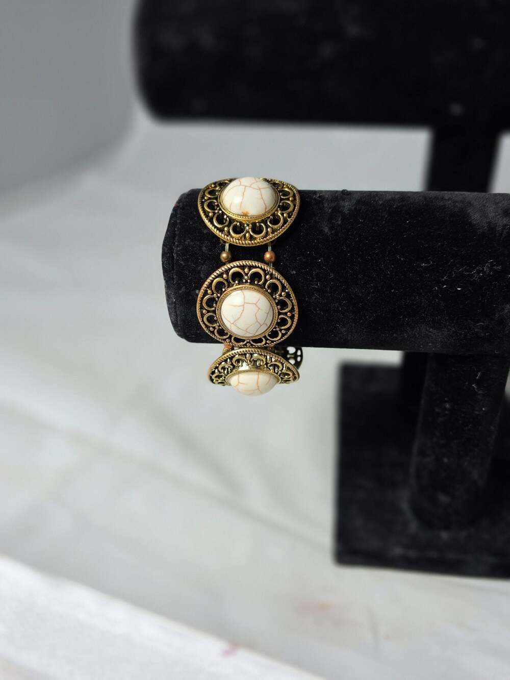 Plunder Design Winston Antique Bronze Tone Hinged Bangle Bracelet with Cream Fau